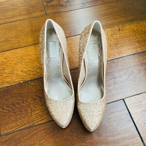 Gold sparkle shoes. 4 1/2 inch heels. Perfect for special occasions.